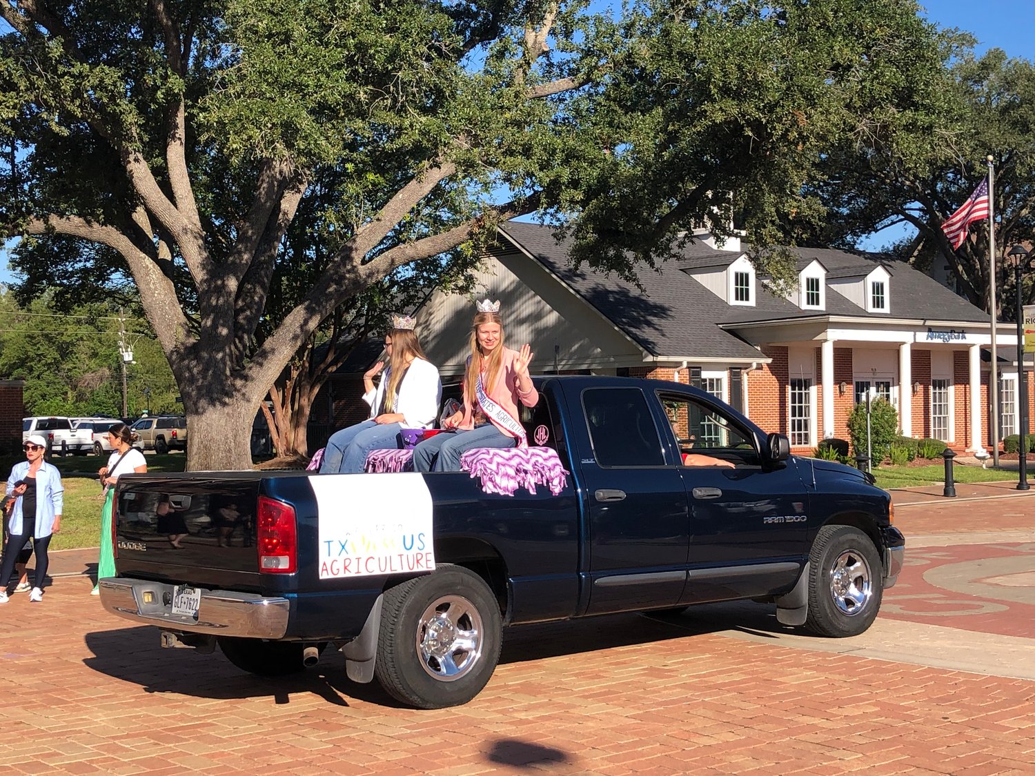 Jaime Hahn, right, Miss U.S. Agriculture from Waller County, was among the dignitaries at Saturday's Katy Rice Festival Parade.